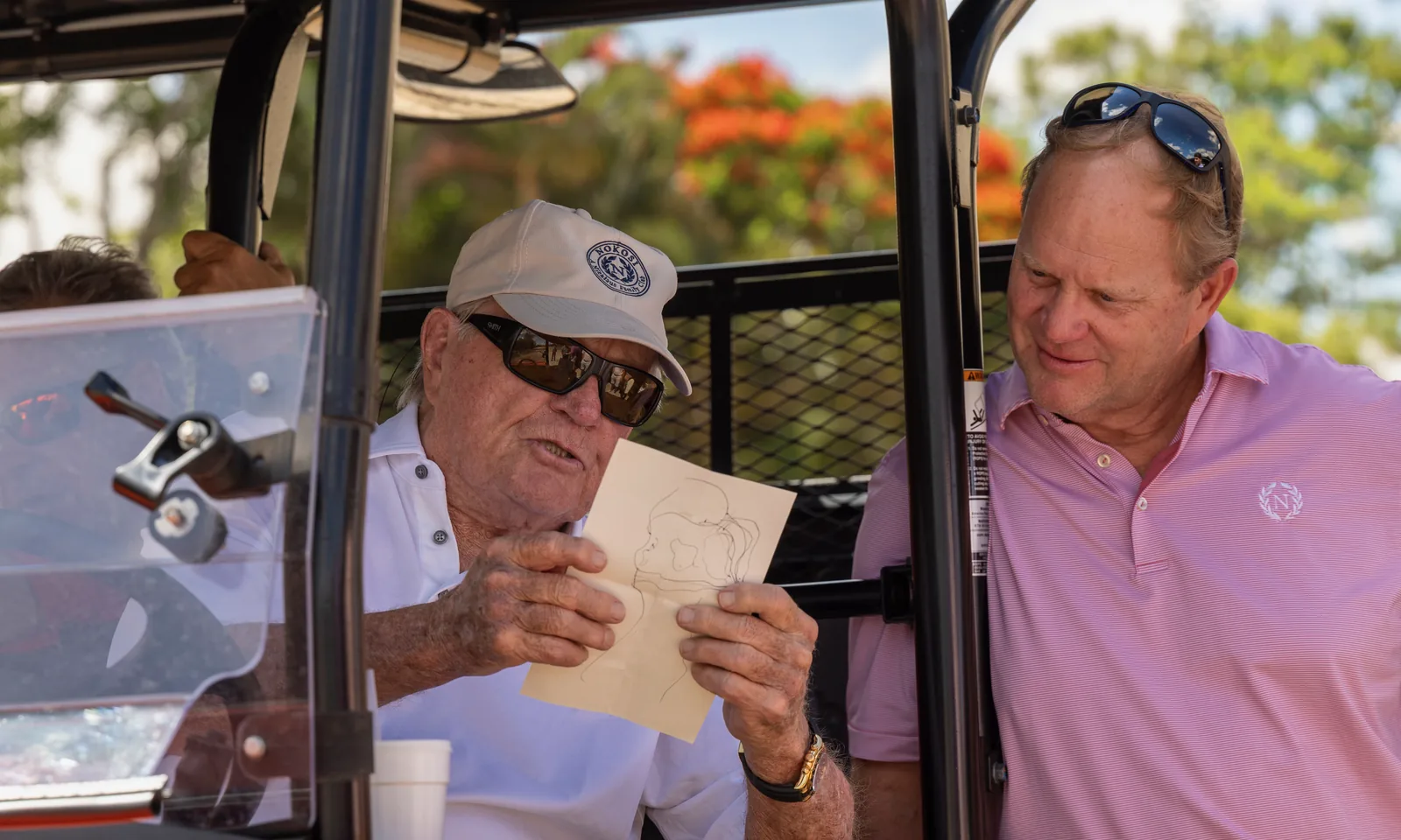 Jack and Gary Nicklaus reviewing the NOKOSI routing plan