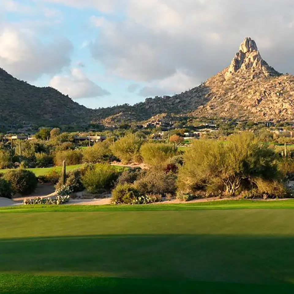 Pinnacle Peak rising behind a fairway at Desert Highlands