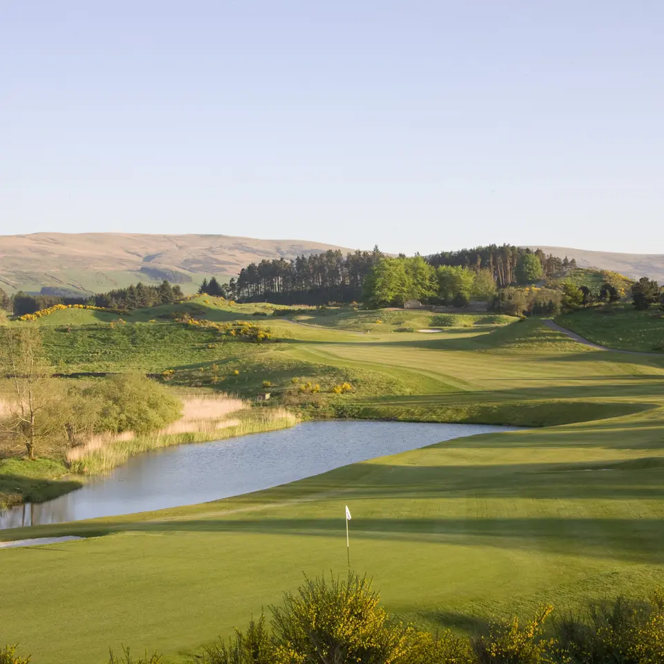 The 9th at Gleneagles, green to tee, with the Ochil Hills beyond
