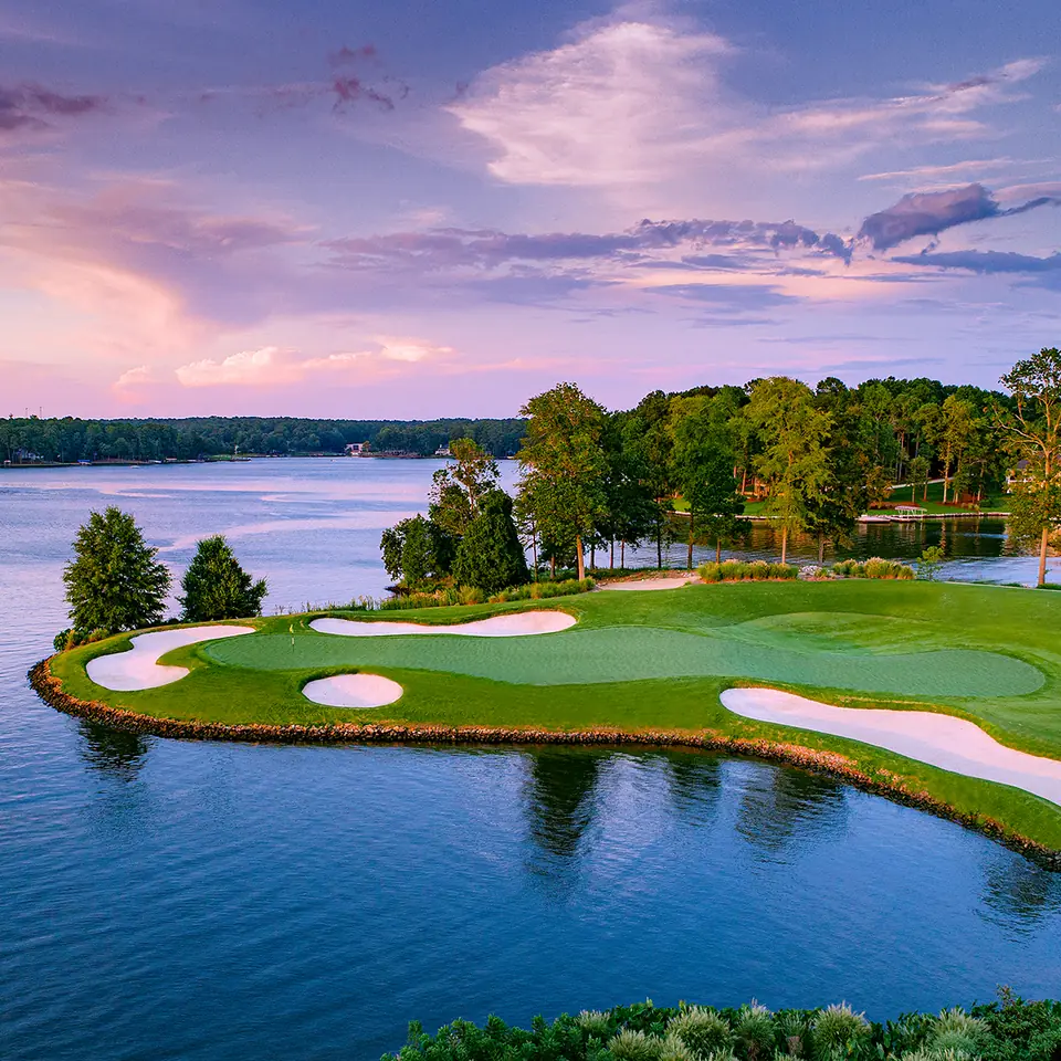 A peninsula green at Great Waters on Lake Oconee at dusk