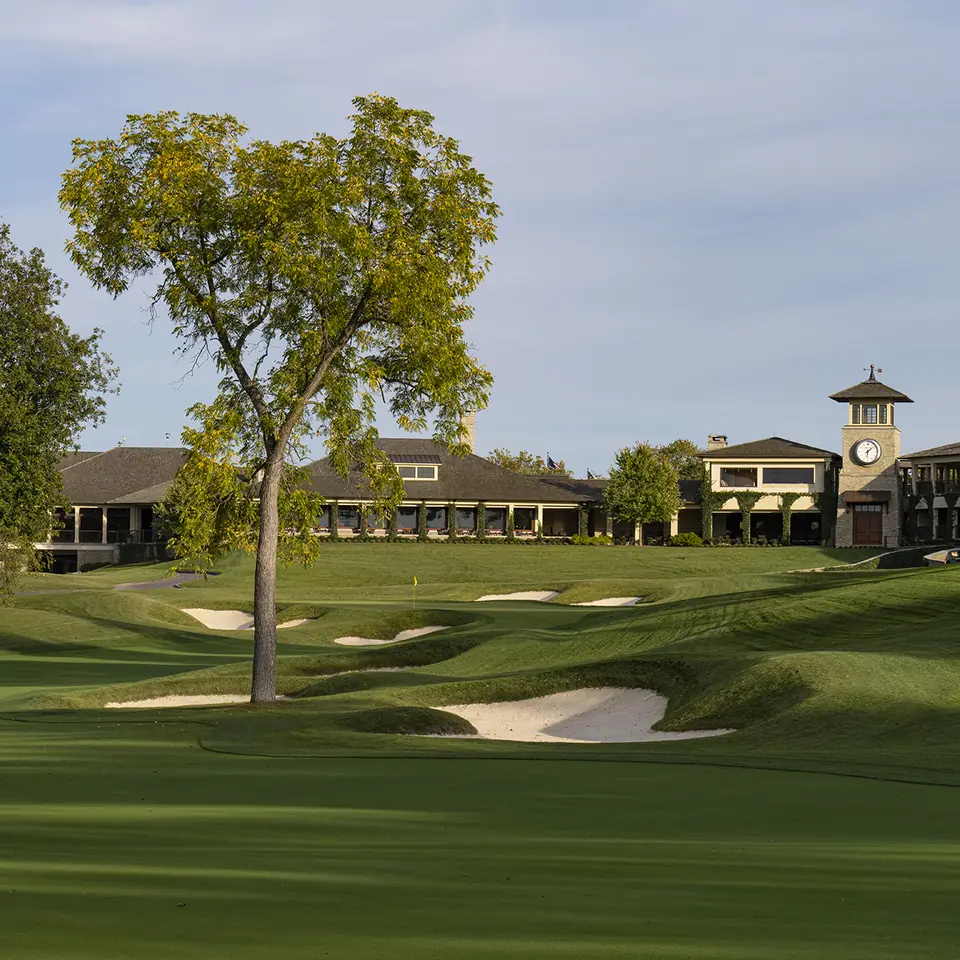 The 18th green at Muirfield Village beneath the clubhouse