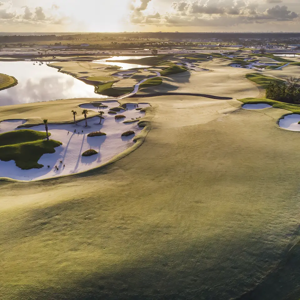 Aerial view of Panther National, bunkers across the sand